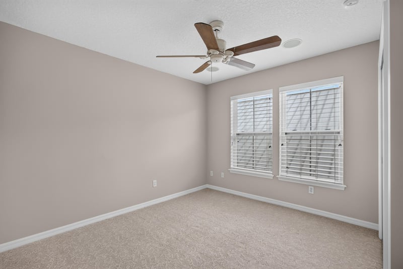 Empty bedroom with windows at 117 Island Cottage Way, St. Augustine, FL 32080