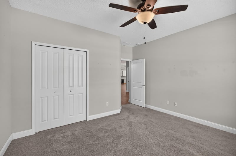 Closet doors in carpeted hallway at 53 Lumen Ct, St. Augustine, FL 32095