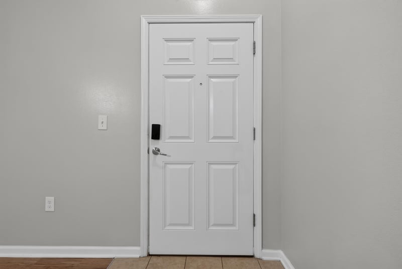 Interior door off the entry hallway at 8196 Cabin Lake Cir, Jacksonville, FL 32256