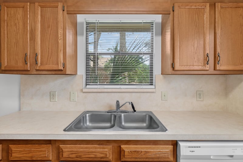 Kitchen sink and counter space at 1445 Classic Oak Rd W, Jacksonville, FL
