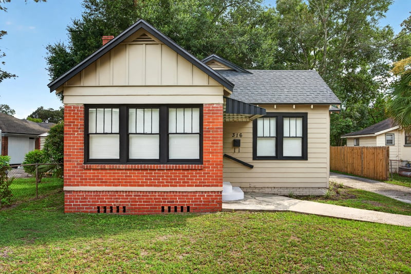 Front exterior with brick base and covered porch at 316 W 41st St, Jacksonville, FL 32206