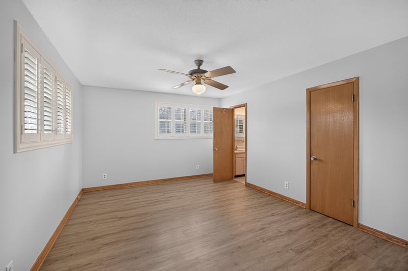Empty bedroom with ceiling fan and plantation shutters at 1834 Memory Ln, Jacksonville, FL