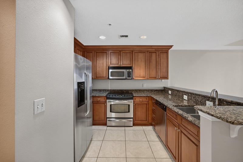 Kitchen with stainless appliances and granite at 1478 Riverplace Blvd 1904, Jacksonville, FL 32207