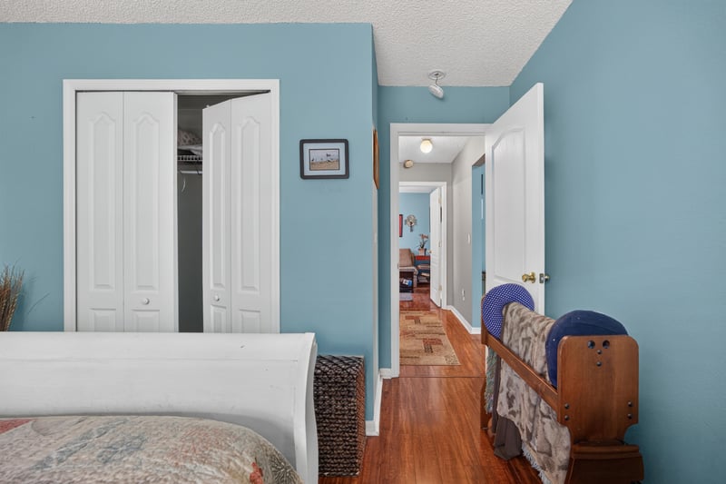 Bedroom with closet doors and hallway view at 145 Dover Bluff Dr, Orange Park, FL