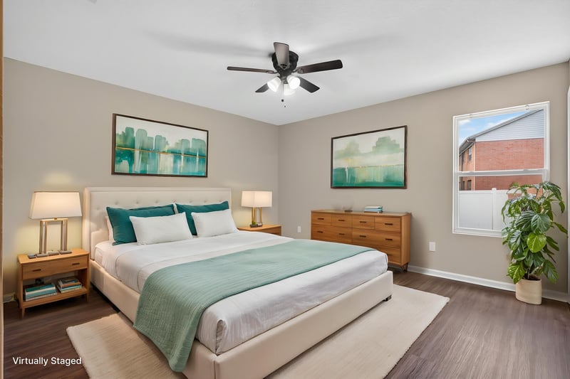 Bedroom virtually staged with bed and ceiling fan at 7253 Townsend Village Ct, Jacksonville, FL