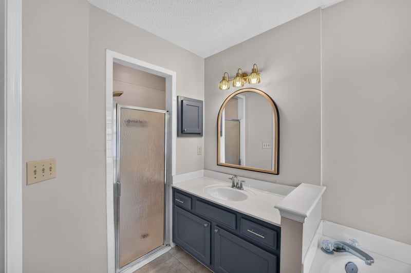 Primary bathroom with shower and sink at 11828 Heather Grove Ln, Jacksonville, FL