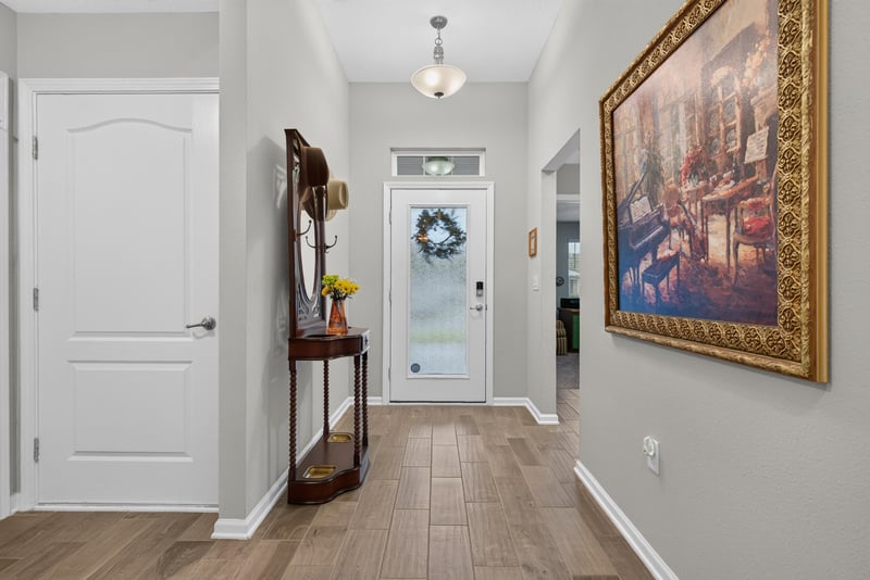 Foyer with glass-panel front door at 4319 Green River Pl, Middleburg, FL 32068