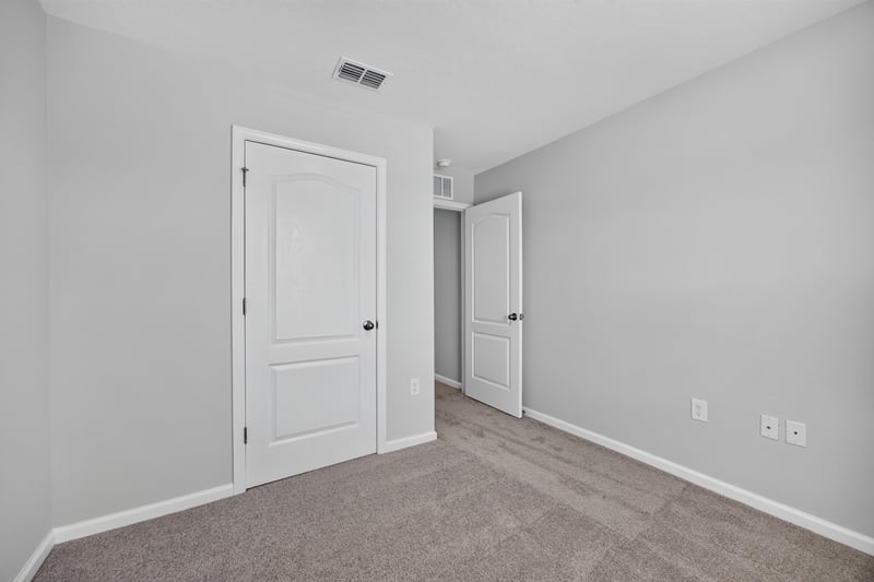 Hallway with closet doors at 2837 Black Buck Cir, Jacksonville, FL 32225