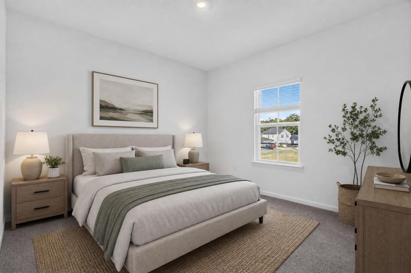Virtually staged bedroom with bed and nightstands at 269 Bluegrass Wy, St. Augustine, FL 32092