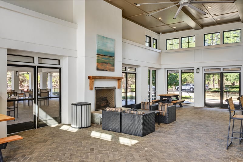 Clubhouse sitting area with fireplace in Whisper Creek