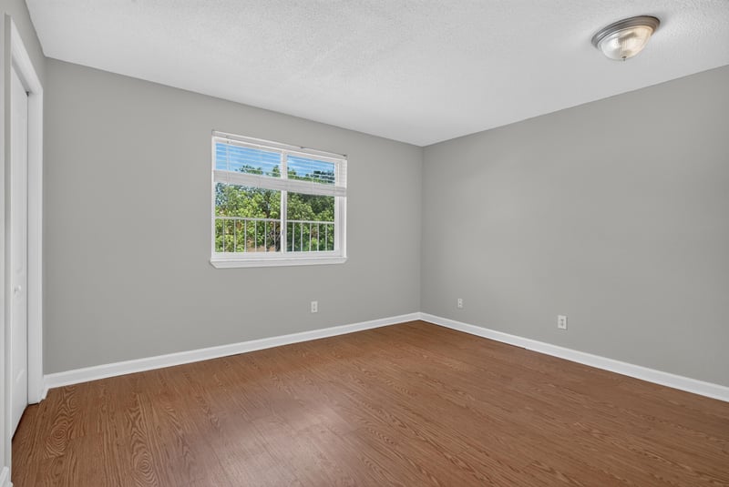 Bedroom with window at 3866 Campenero Ct unit 6, Jacksonville, FL 32217