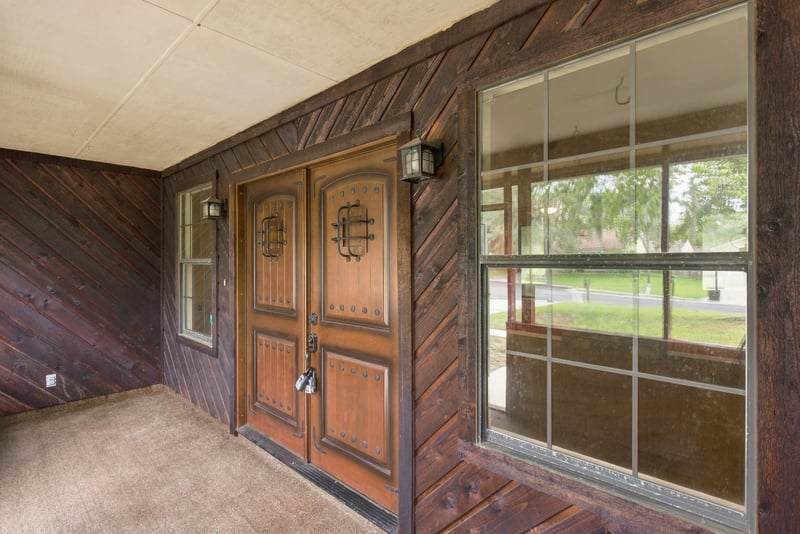 Wood-framed doors and windows facing the front yard at 2915 Trenton Ct, Orange Park, FL