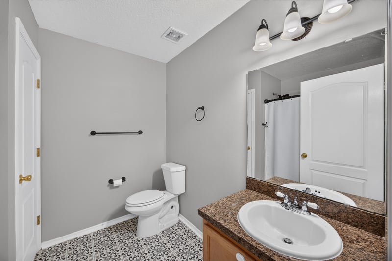 Bathroom vanity with tile flooring at 7545 Lirope St, Jacksonville, FL 32244