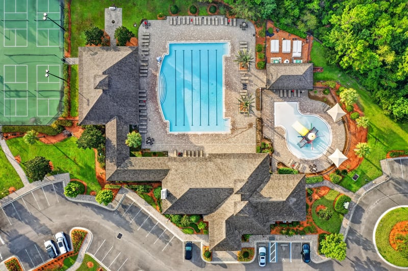 Drone view of community pool complex in River Glen