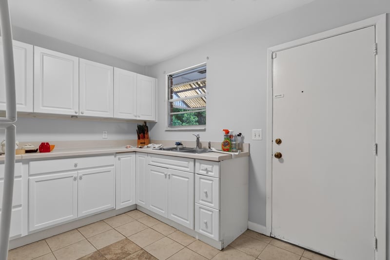 Second kitchen with entry door at 5745 110th St, Jacksonville, FL 32244