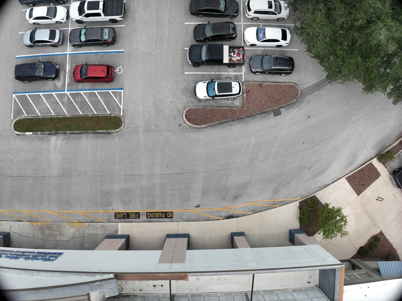 Aerial view of parking rows and curved drive at 9406 Atlantic Blvd, Jacksonville, FL 32225