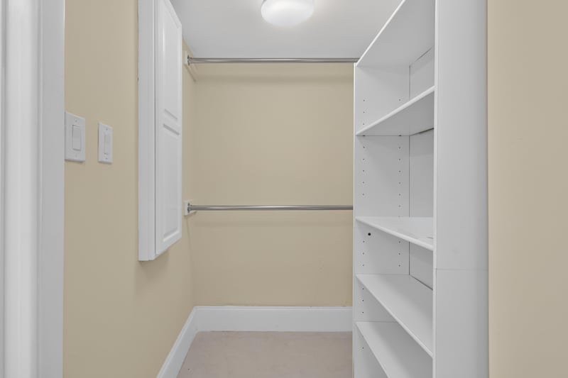 Walk-in closet with shelving at 1301 1st St S