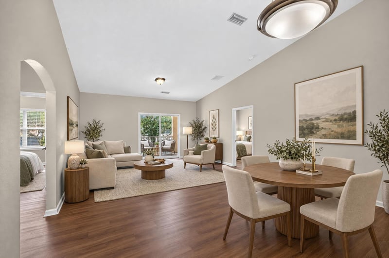 Living and dining area staged with sofa and table at 3750 Silver Bluff Blvd, Orange Park, FL