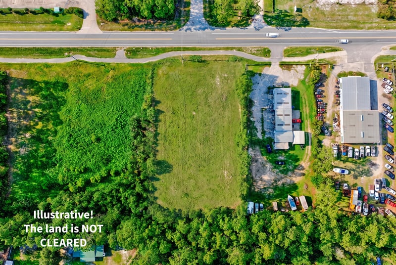 Aerial with text overlay noting the land is not cleared at 4393 Co Rd 218, Middleburg, FL 32068