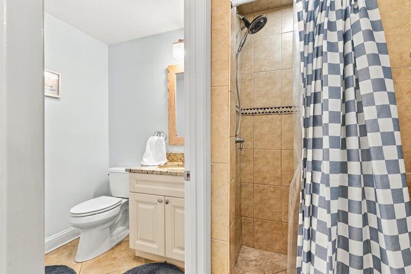 Bathroom with tub-shower and toilet at 805 Spinnakers Reach Dr, Ponte Vedra Beach, FL 32082