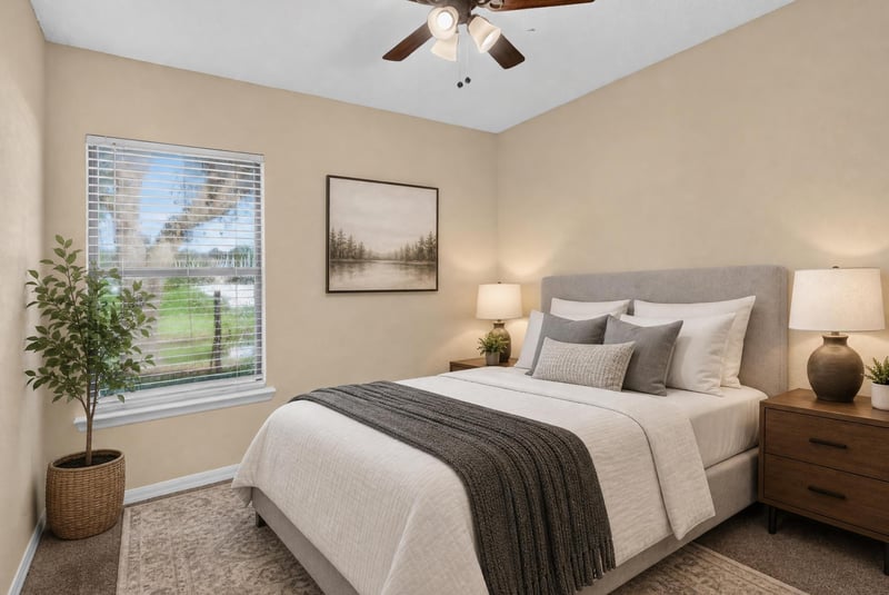 Bedroom virtually staged with bed and nightstands at 353 Redwood Ln