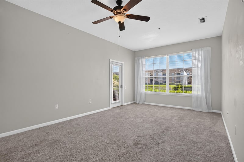 Living room with carpet and natural light at 7990 Baymeadows Rd E #404, Jacksonville, FL 32256