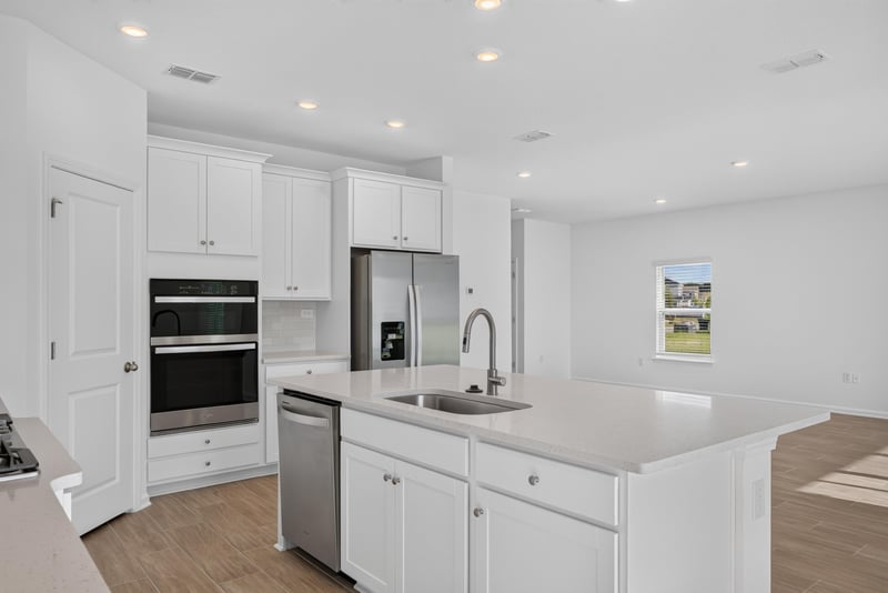 Kitchen sink, dishwasher drawer and refrigerator at 269 Bluegrass Wy, St. Augustine, FL 32092
