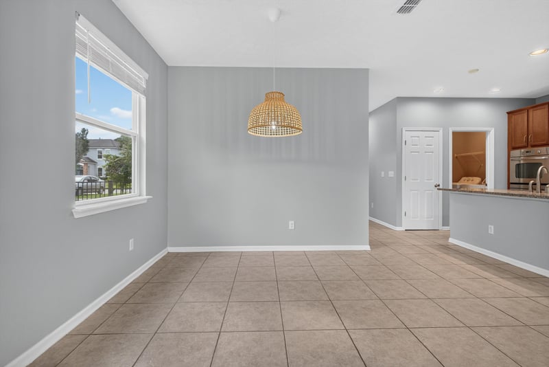 Dining area with window and pendant light at 13685 Goodson Pl, Jacksonville, FL 32226