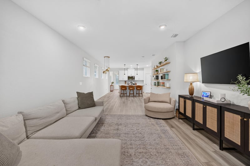 Living room facing open kitchen at 93 Lochloosa Ct, St. Johns, FL 32259