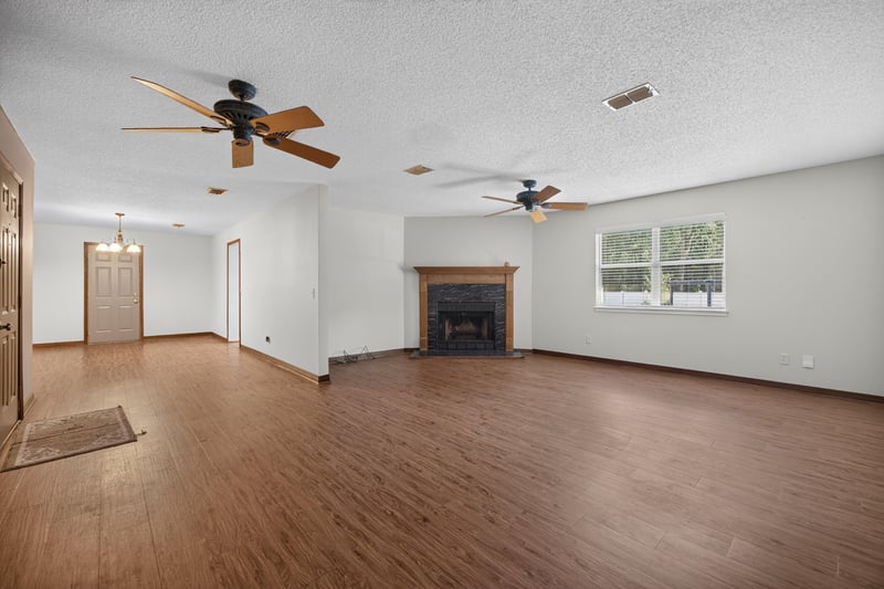 Living room with ceiling fan and window at 892 Branscomb Rd, Green Cove Springs, FL