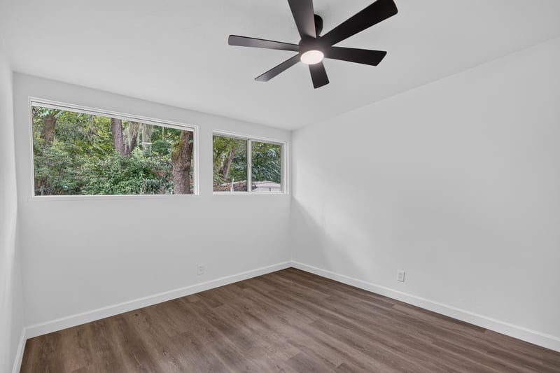 Bedroom with ceiling fan and natural light at 3113 Kline Rd, Jacksonville, FL 32246