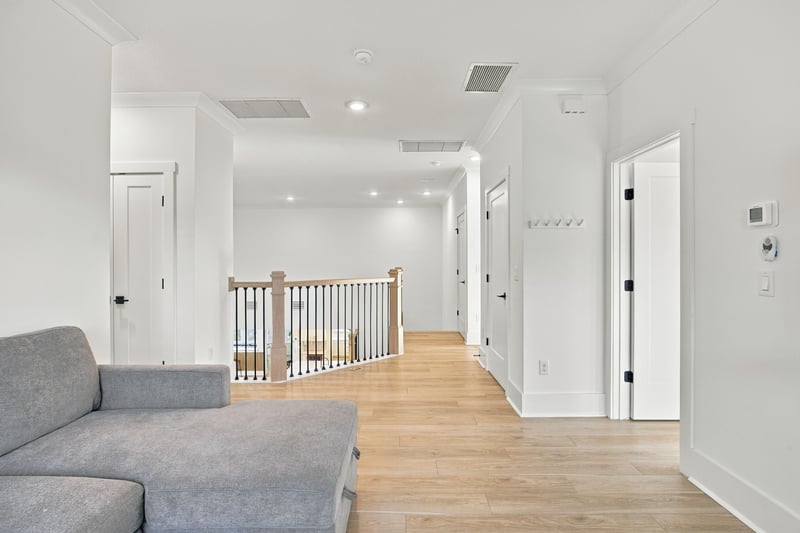 Upstairs hallway landing at 907 Seagrove Dr, Ponte Vedra Beach, FL 32081