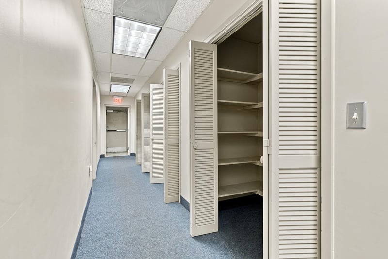 Hallway with built-in shelving units at 101 Scholars Wy