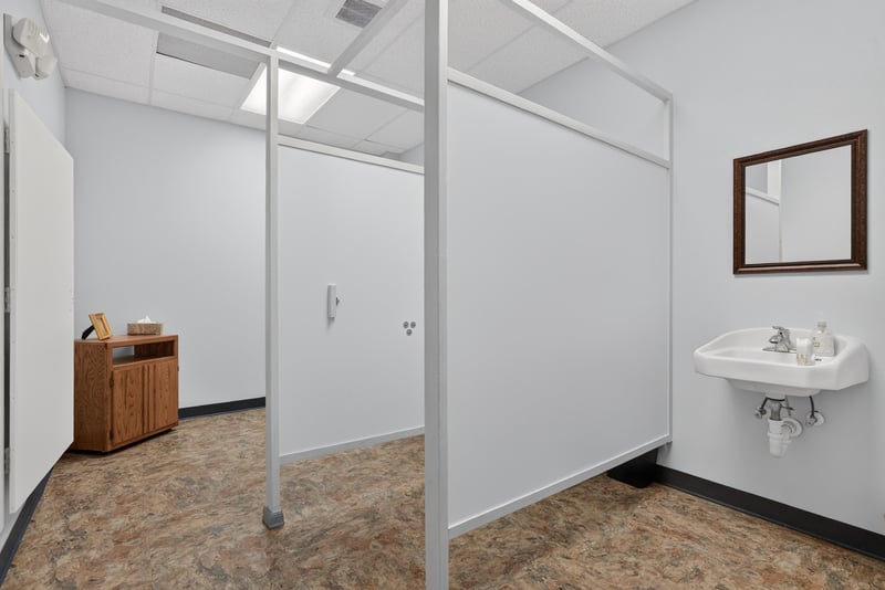 Restroom with stall dividers and sink at 1038 County Rd 315, Melrose