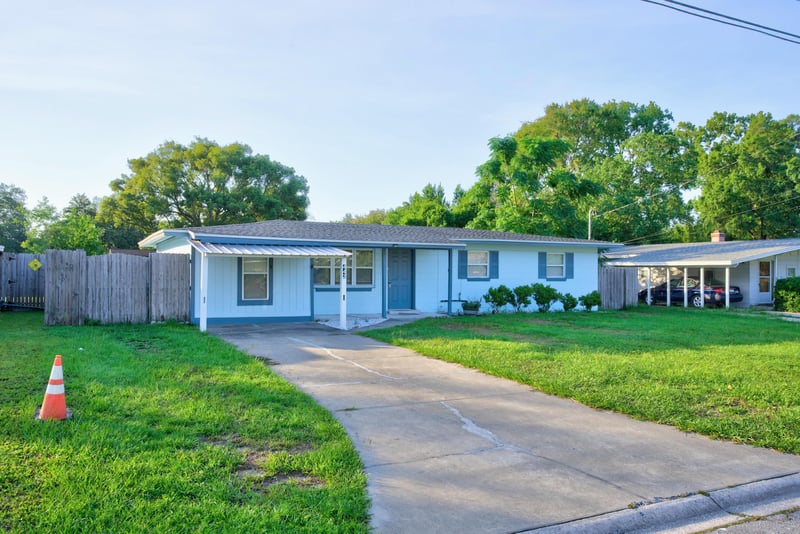 Front exterior view down driveway at 442 Ameca Ave, Orange Park, FL 32073