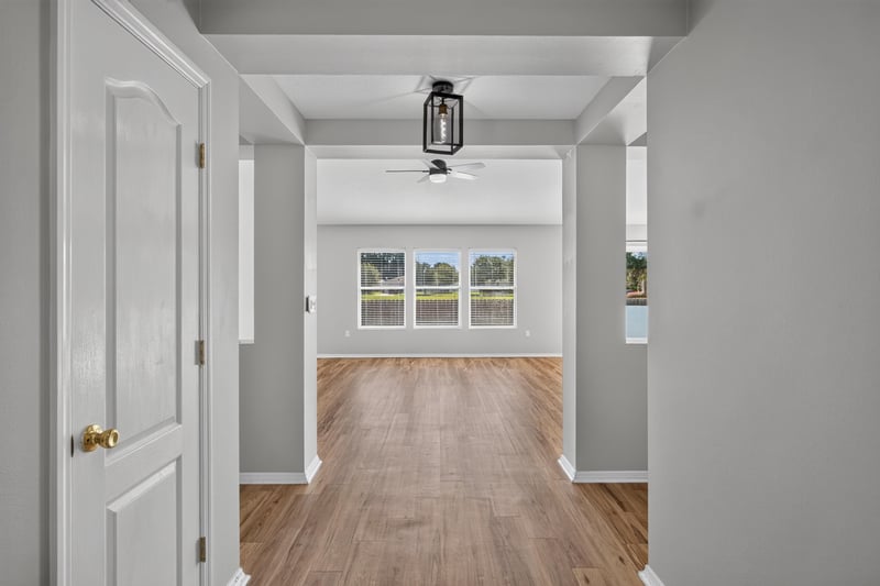 Entry hallway with wood flooring at 7545 Lirope St, Jacksonville, FL 32244