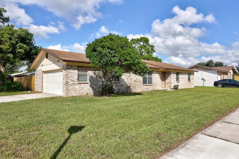 Front Left and Garage at 8903 Kersey Dr, Jacksonville, FL 32216
