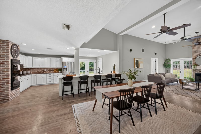 Kitchen with island open to dining and living at 1161 Whispering Pines Rd, Jacksonville, FL 32259