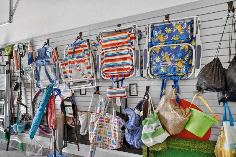 Garage wall storage for beach chairs and gear at 785 Back Creek Dr, St. Augustine, FL 32092
