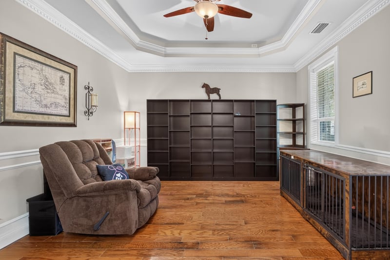Living room with recliners and built-in bookshelf at 1735 Hagans Ridge Ct