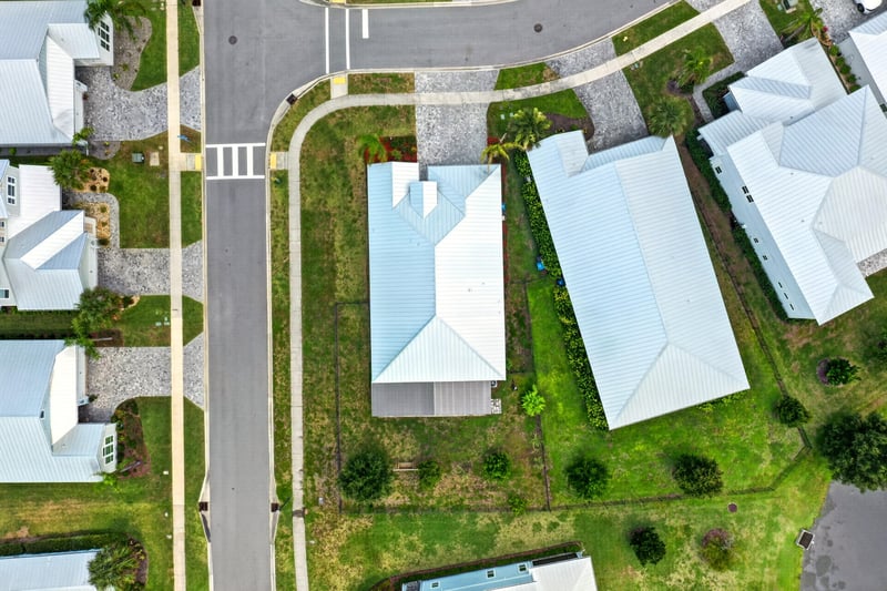 Top-down drone view of the home and street at 91 Tilloo Ct, St. Johns, FL