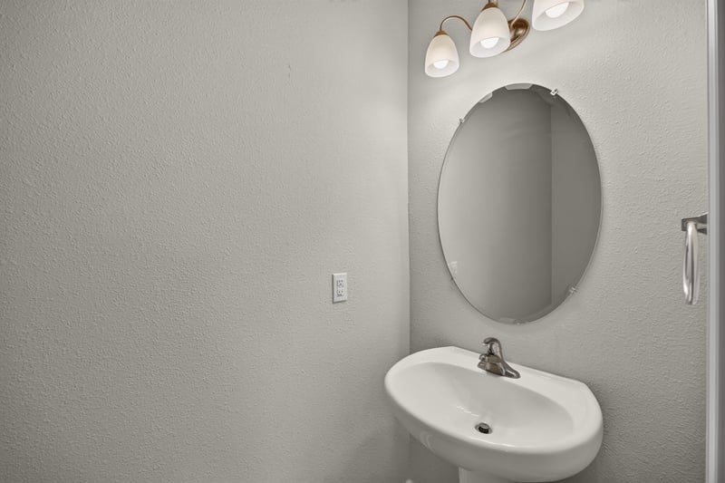 Powder room with pedestal sink at 331 Millerstone Dr, St. Augustine, FL 32092