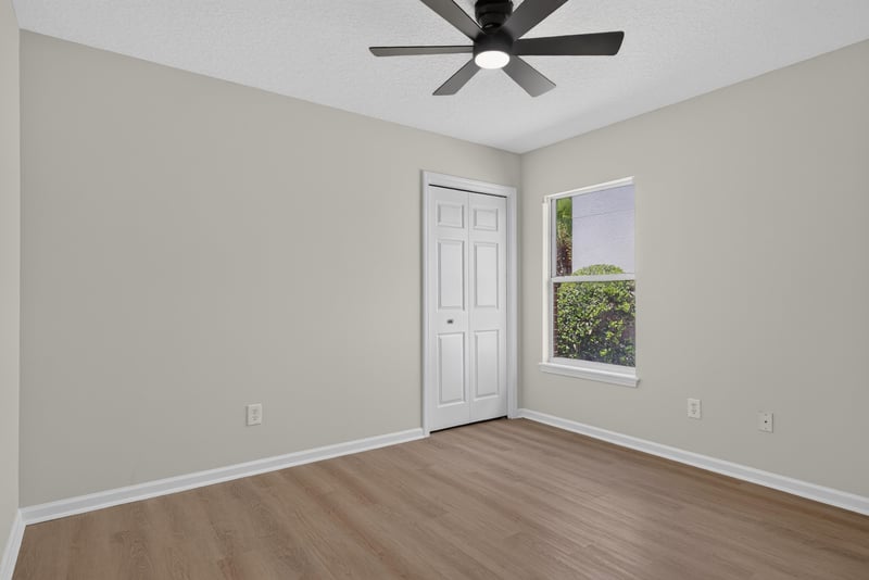 Empty room with wood-look flooring at 224 Pine Arbor Cir, St. Augustine, FL 32084