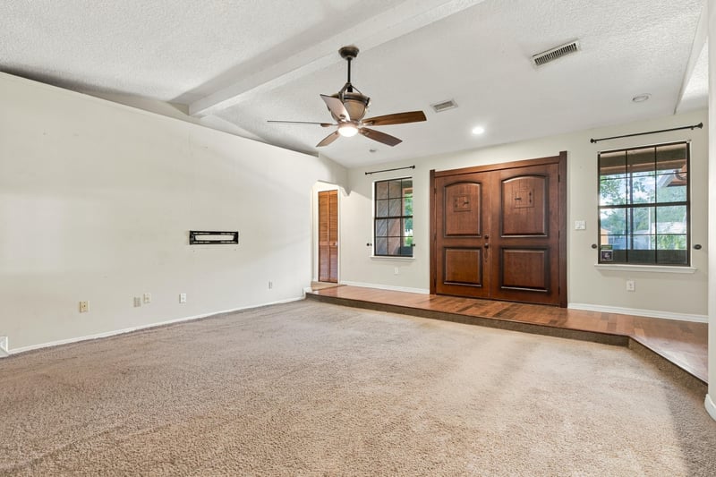 Hallway with wood flooring leading to bedrooms at 2915 Trenton Ct, Orange Park, FL