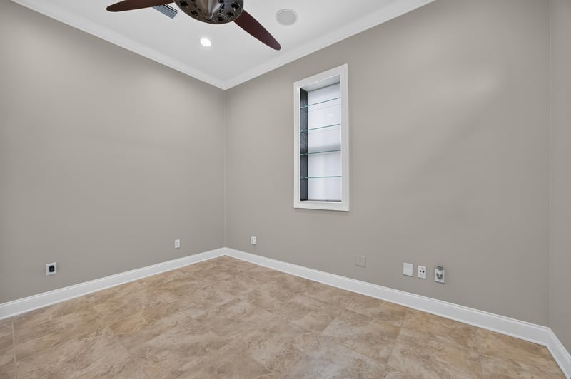 Empty room with window and ceiling fan at 117 Island Cottage Way, St. Augustine, FL 32080