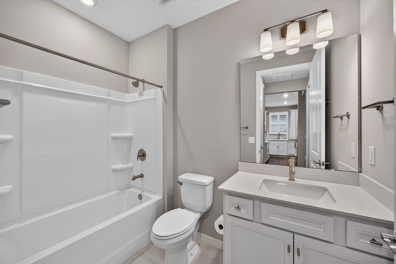 Bathroom with tub-shower combo and vanity at 171 Oyster Shell Ter, Nocatee, FL 32081