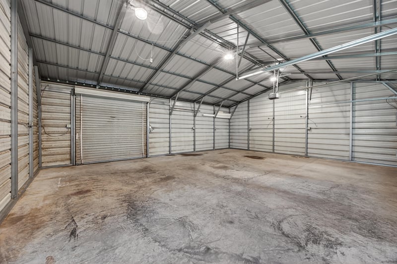 Interior of the detached garage with open floor space at 1619 Hammond Blvd, Jacksonville, FL