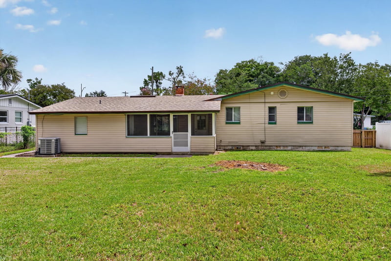 Drone view of the screened porch and yard at 2618 Arlex Dr E, Jacksonville, FL