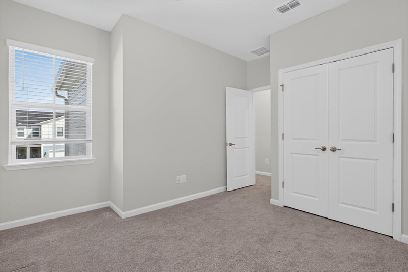 Bedroom with carpet and window at 39 Mellowood Ln, St. Augustine, FL 32092
