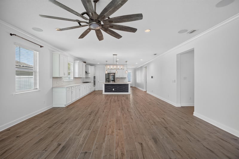Open living area with kitchen island visible at 855 Flach Dr, St. Johns, FL